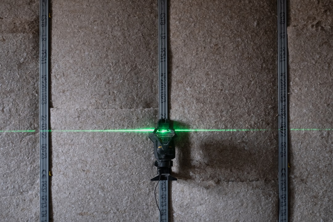 a-green-light-on-a-wall-vqthgj2ekve